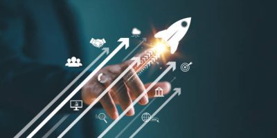 Growth strategy busines trend concept. Businessman hand on arrow investment icon. Increase sale marketing, increase success potential, soar rocket towards wealth. Competitive business goal plan